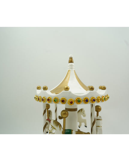 Cutiuta muzicala decorata de Craciun, Carusel rotativ