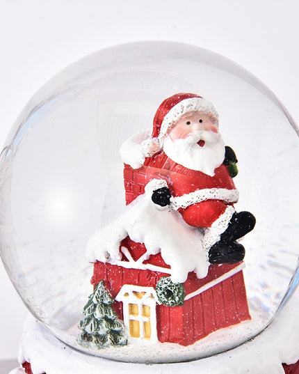 Decoratiune glob cu zapada Mos Craciun pe casa, model 2, diametru