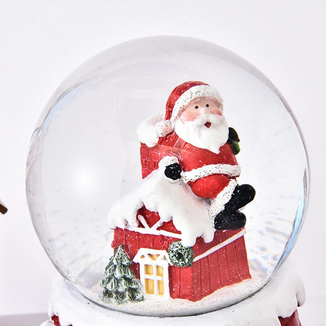 Decoratiune glob cu zapada Mos Craciun pe casa, model 2, diametru