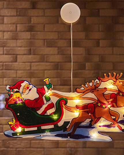Decoratiune de Craciun pentru fereastra Sanie cu reni, cu LED-uri