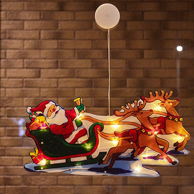 Decoratiune de Craciun pentru fereastra Sanie cu reni, cu LED-uri