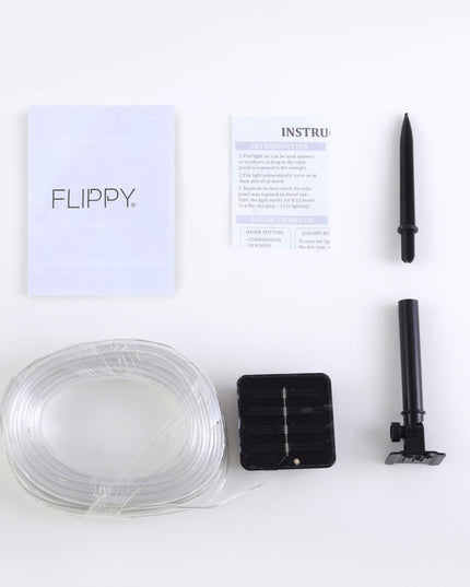 Instalatie luminoasa de Craciun tip furtun luminos, 100 LED-uri, 12 metri lungime, 8 programe, 2 metri prelungitor, sarma din cupru, incarcare solara