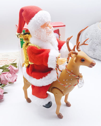 Decoratiune Mos Craciun, Animat, care Canta si Danseaza, cu Saculet, pe Ren, Imbracat Festiv