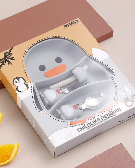 Set diversificare bebelusi din silicon, 23.5 x 12.5 cm, 1 farfurie compartimentata in forma de pinguin, lingurita si furculita, pai, perie pai, fara alergeni, ventuza fixare, forma creativa
