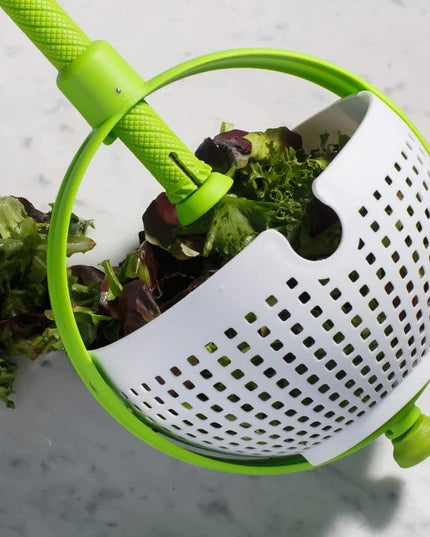 Strecuratoare multifunctionala rotativa, cu maner, material ABS,maner , cu ventuza pentru prindere sigura, practic si usor de folosit